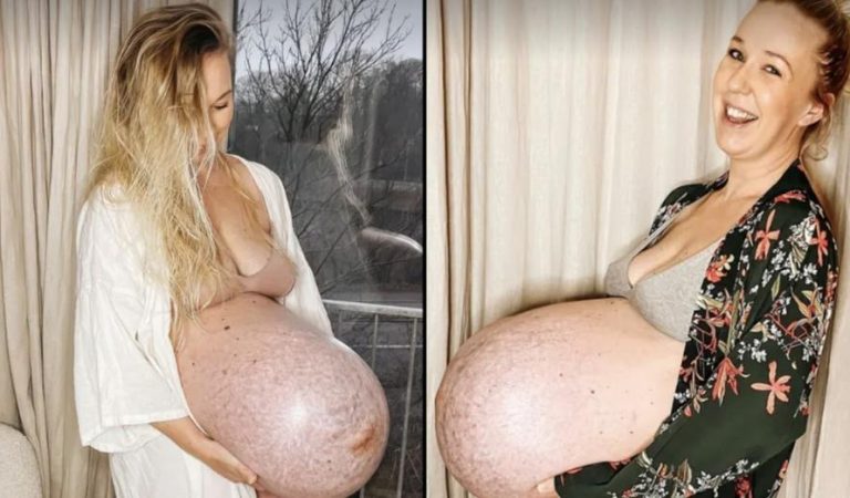 Vrouw die zwanger is van drieling laat unieke babybuik zien (video)